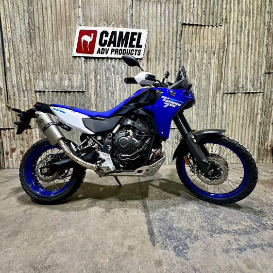 A Yamaha 700 Tenere motorcycle with a Rally bend high exhaust system by Camel ADV Products