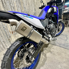 A Yamaha 700 Tenere motorcycle with a Rally bend high exhaust system by Camel ADV Products